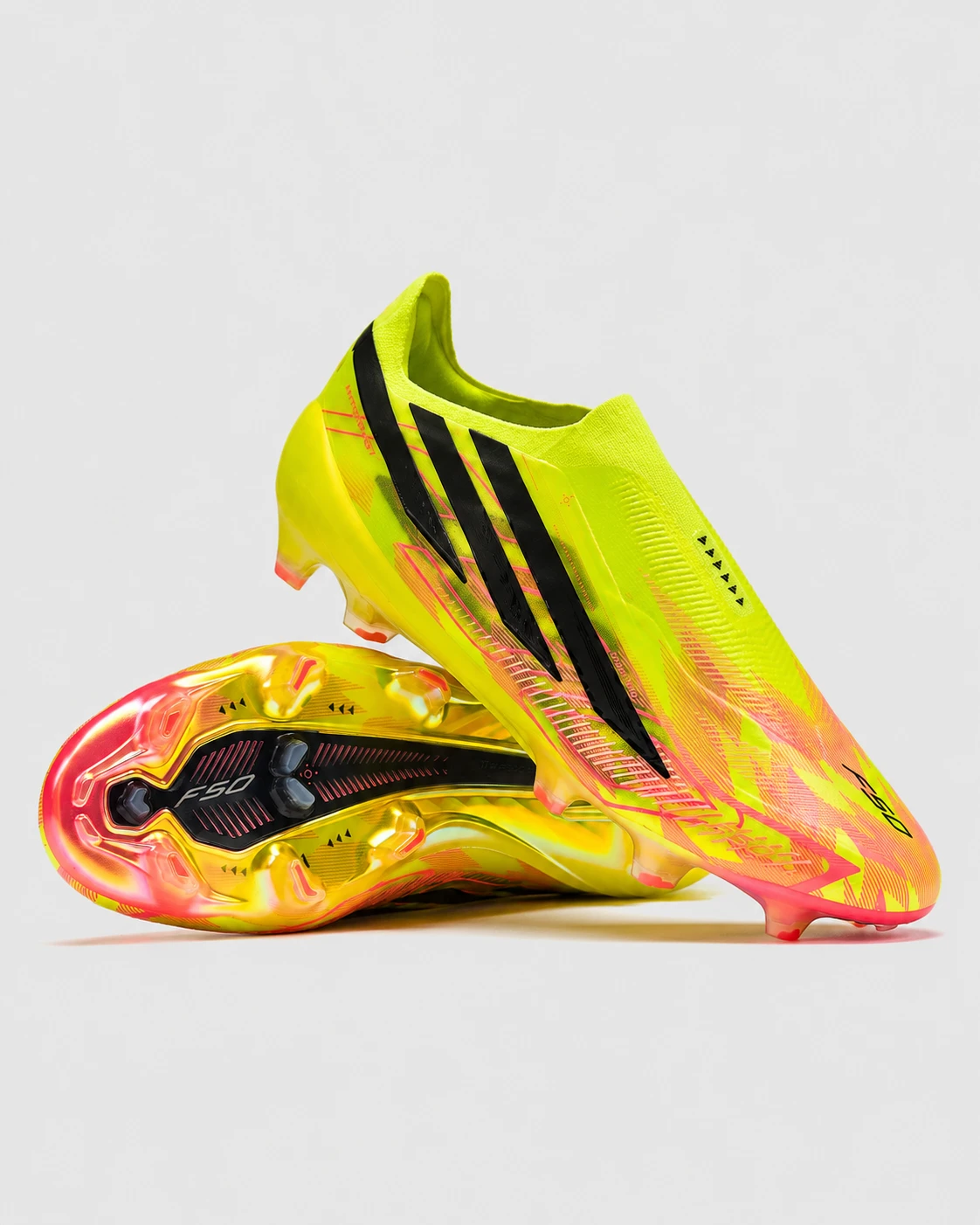 adidas-f50-solar-yellow-pair-side-view adidas F50 hyperfast laceless elite FG solar yellow - Image 1